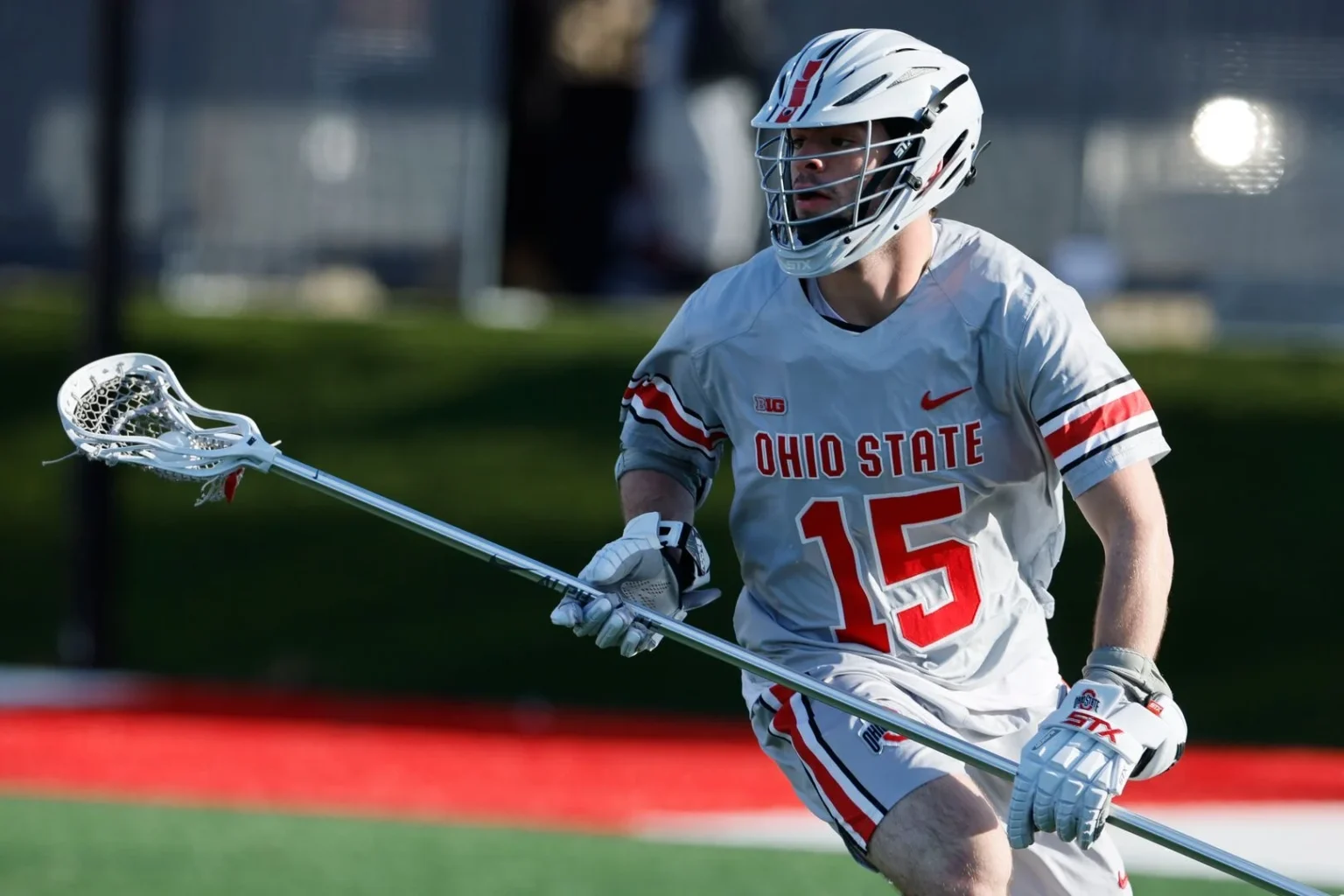 Zack Antoniou playing defense for Ohio State lacrosse